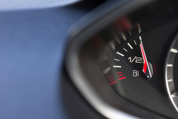 Close Up Of Fuel Gauge In Car Registering Full