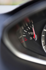 Close Up Of Fuel Gauge In Car Registering Full