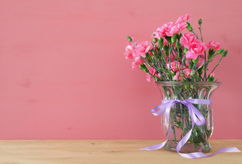 Bouquet of Carnation flowers in the glass vase