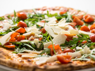 Pizza rucola tomato