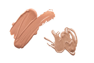 Obraz premium Smudged liquid foundation isolated on white