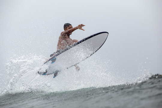 Indonesia, Java, man surfing