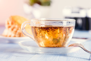 A glass of hot tea