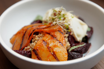 Appetizer of baked beetroot and grilled pear