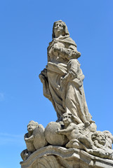 Fototapeta na wymiar Baroque statue of St. Anna in the city historical center at Kutna Hora