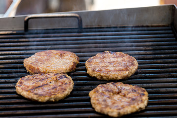 Grilled meat / pork burgers, grill, smoke and light aroma - Cooking grill burgers process