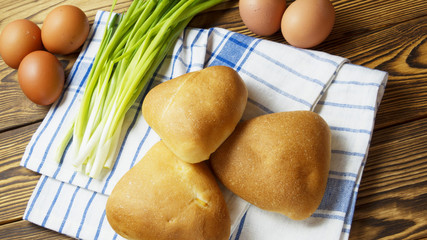 pies with egg and green onions © olgapavlova