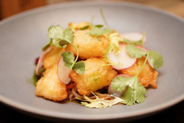 Fish tempura in grey plate