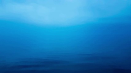 Misty scenery in Greece with a dramatic sky and the calm sea.
