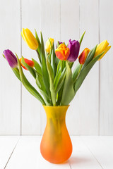 Bouquet of colorful tulips in vase