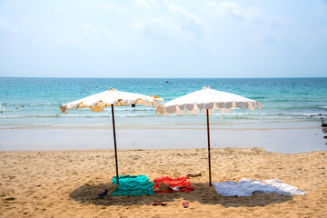White umbrellas on beautiful beach at Samed island, Thailand