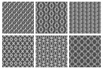 Ornamental white floral pattern set on gray backgrounds