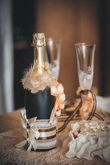 Champagne bottle with a wedding decoration