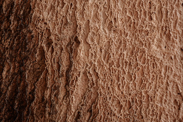 texture of a stone a close up of brown color with dark streaks
