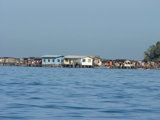 Fishing huts houseboats over sea in Borneo Malaysia