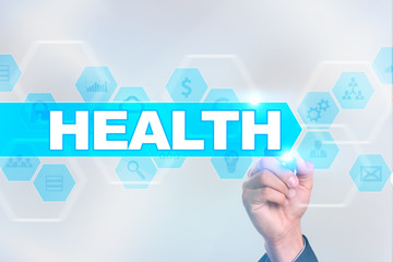 Medical doctor drawing health on the virtual screen.