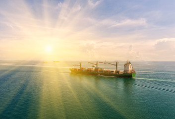 Obraz premium container ship in import export and business logistic.By crane ,Trade Port , Shipping.cargo to harbor.Aerial view.Top view.