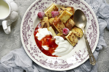 French toasts with yogurt and berry jam.Top view.