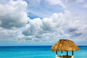 Travel background with straw screen and sky.