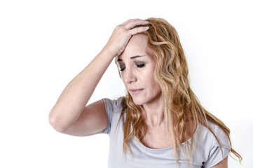 Fototapeta premium depressed woman looking desperate in pain face expression suffering migraine and headache