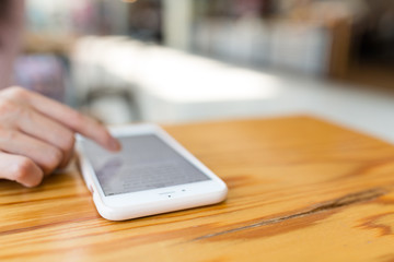 Woman touch on mobile phone