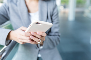 Businesswoman use of mobile phone at outdoor