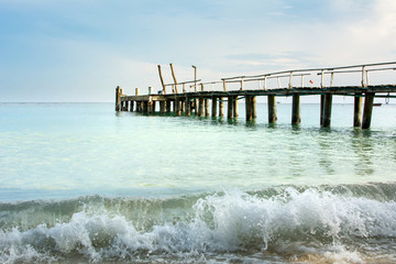 Wooden dock and small wave in Thailand seaside