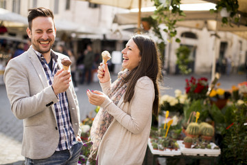 Loving couple having an ice cream in Rome, Italy