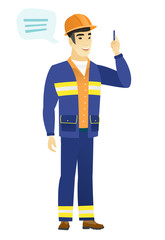 Young asian builder with speech bubble.