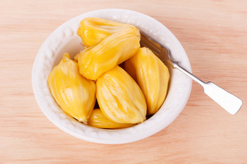 Tropical fruit Jackfruit (jakfruit, jack, jak) in bowl. Selective focus © jantima