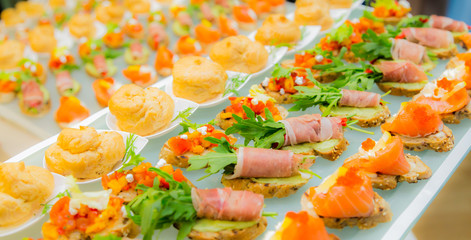 Delicacies and snacks in the buffet. Seafood. A gala reception. Banquet. Catering.