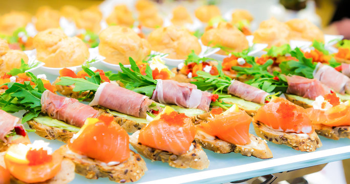 Delicacies and snacks in the buffet. Seafood. A gala reception. Banquet. Catering.