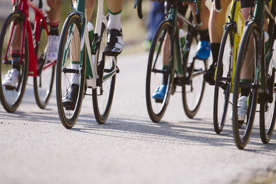 Group of cyclists riding a bike in a cycling race. Racing Bike.