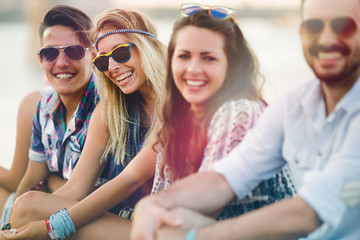 Happy group of young people enjoying festival