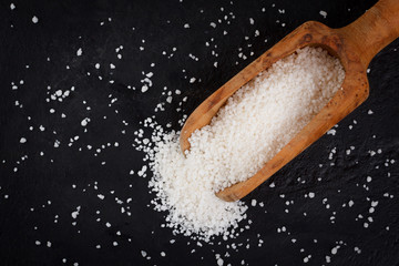 Granulated cassava (tapioca) on black background
