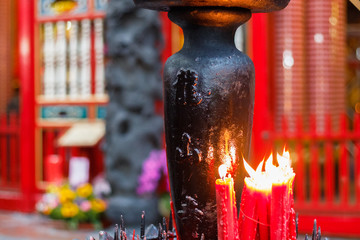 Worship with red candles at Lungshan Temple in Taiwan