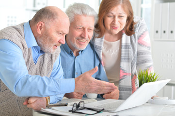 Older people with a laptop