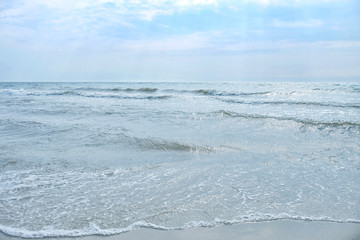 Naklejka na ściany i meble Sea beach with coastal waves