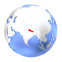 Nepal on metallic globe isolated