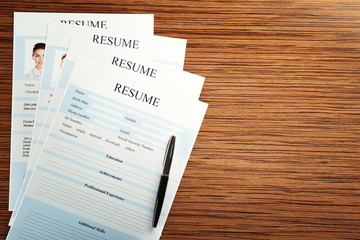 Employer workplace with resumes