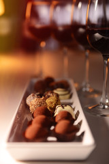 Assorted chocolates in plate closeup
