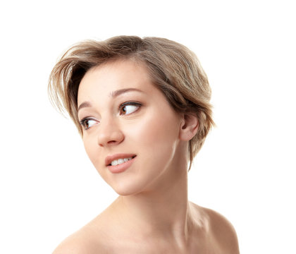 Young woman with trendy hairstyle on white background