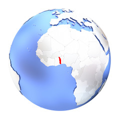 Togo on metallic globe isolated