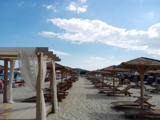 Beach beds on the private beach with umbrella ,romance time seeing the sea