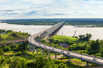 Khabarovsk Bridge crosses Amur - obrazy, fototapety, plakaty
