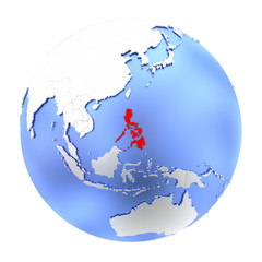 Philippines on metallic globe isolated