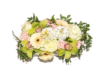 Top view of the fresh spring bouquet of flowers isolated on white
