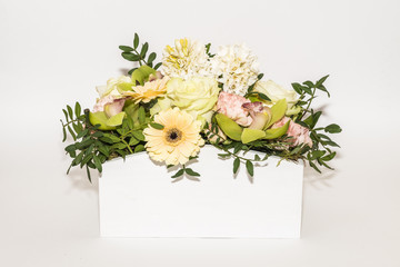 Bouquet of spring flowers: gerbera, rose In bright colors