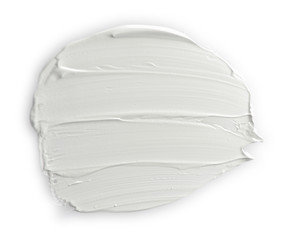 Smear cream isolated on white background. Cream texture.