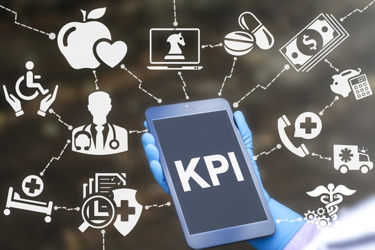 Key performance indicator medicine plan concept. Doctor offer tablet pc with KPI word. Health care strategy and medical planning technology